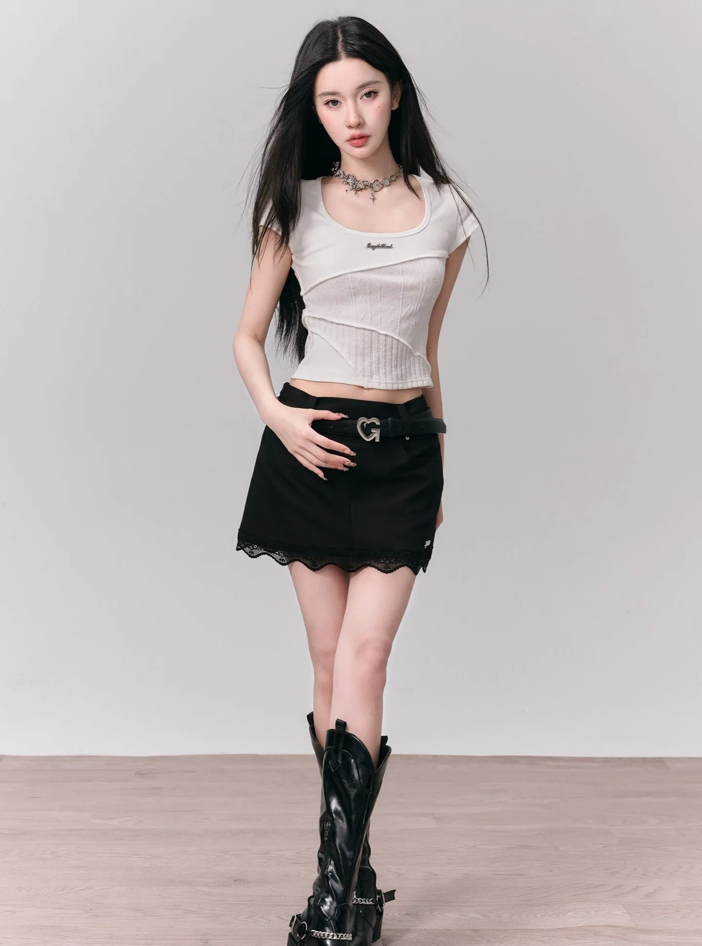 Classic Elegance Mini Skirt: Black Denim with Scalloped Lace Hem