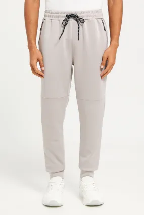 Men Beige Jogger Pants With Zip Pockets